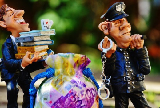 police arresting tax offender - carry on corruption