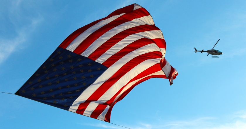 US banner with helicopter